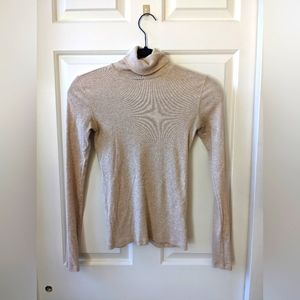 The Prima Micro-Rib Turtleneck in Heathered Oat